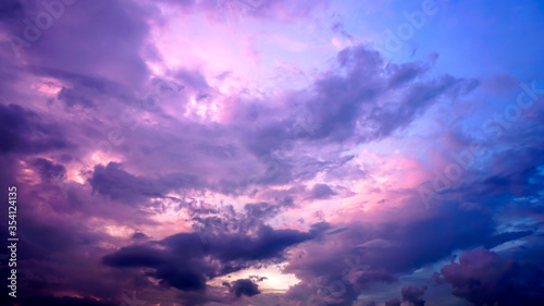 Colorful sunset with clouds in the evening,  © surasak