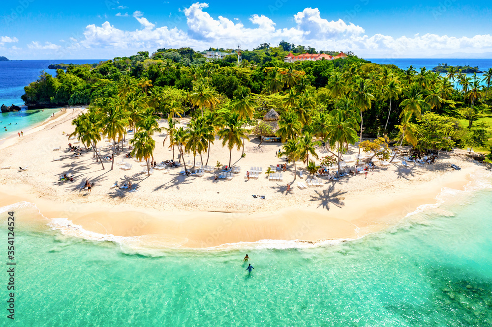 Aerial drone view of beautiful caribbean tropical island Cayo Levantado beach with palms. Bacardi Island, Dominican Republic. Vacation background.