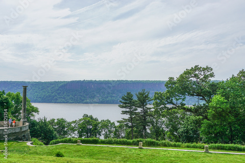 Yonkers, New York, USA: A young couple views the Palisades, across the Hudson River from the Untermyer Park and Gardens in Yonkers, New York.