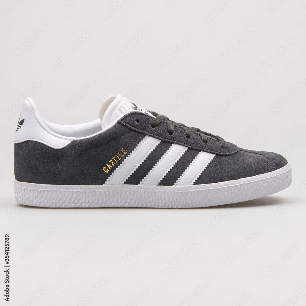 VIENNA, AUSTRIA - FEBRUARY 14, 2018: Adidas Gazelle dark grey and white  sneaker on white background. Stock Photo | Adobe Stock