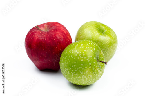 red and green apples on a white background 