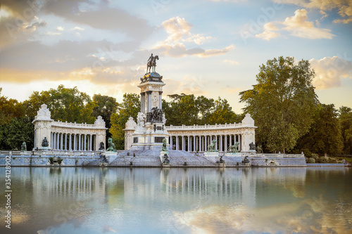 Monument Alfonso XII in the Retiro Park in Madrid. Sunrise.
