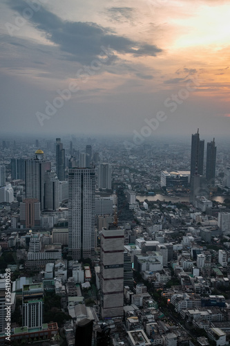 panoramic skyline of Bangkok at sunset from King Power Mahanakhon, Bangkok, Thailand