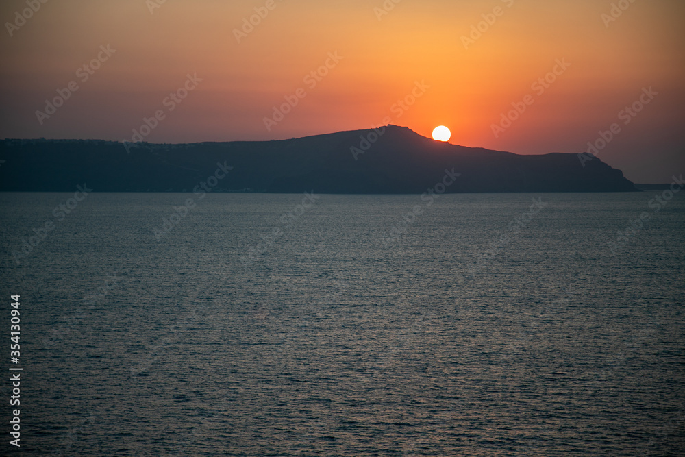 Santorini sunset from Fira, capital of the Greek Aegean island, Greece