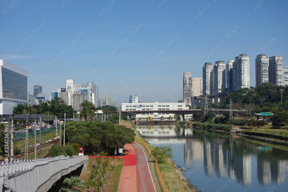 Sao Paulo/Brazil: Tiete river, cityscape and buildings