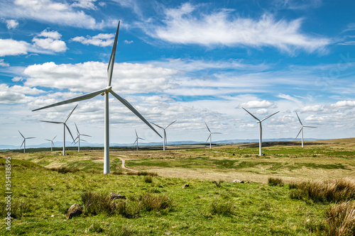 Wind turbines on Whitelee wind farm in Scotland on a  sunny spring day.