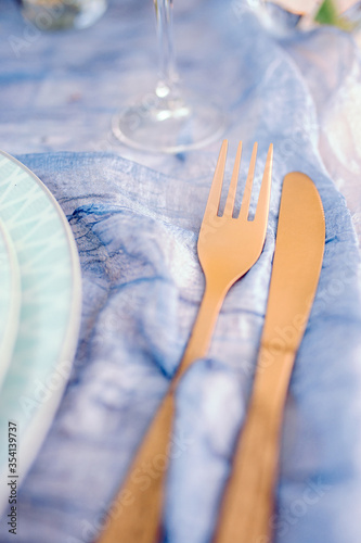 Golden knife and fork.