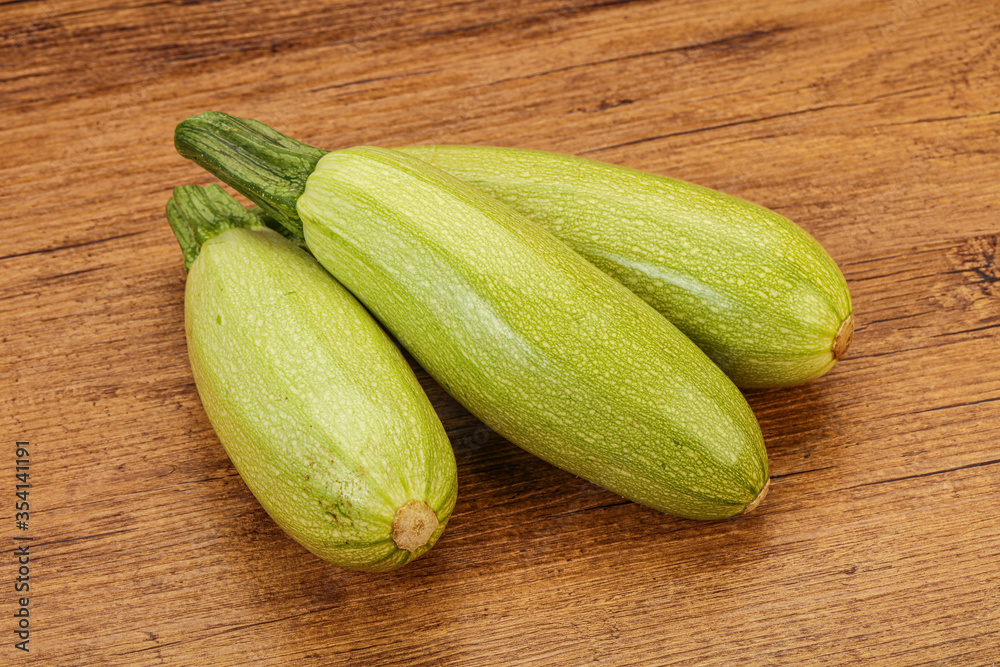 Young tasty zucchini over board Young tasty zucchini over board