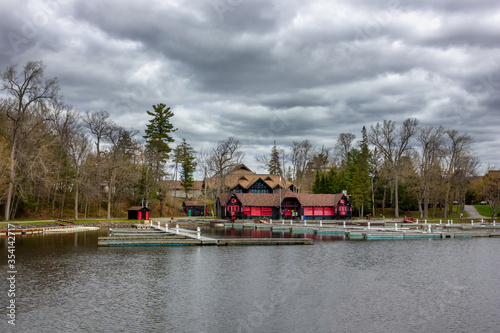  waterfront cottage and marine yacht port view under a scenic sky  in Canada, Quebec photo
