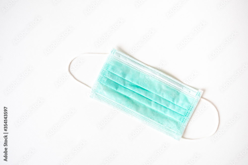 Coronavirus COVID-19 pandemic. Antiviral medical mask for protection against corona virus Coronavirus COVID-19 pandemic. Antiviral medical mask for protection against corona virus