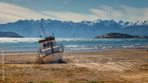 boat aground on the beach of the General Carrera lake, Chilean Patagonia