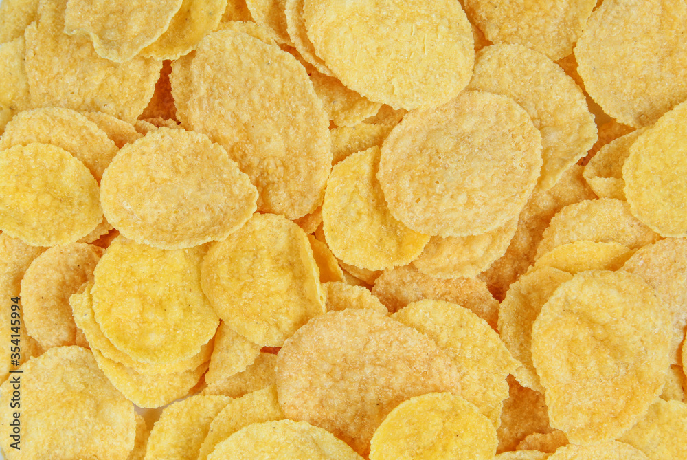 Yellow cornflakes close-up. Full frame of healthy breakfast food