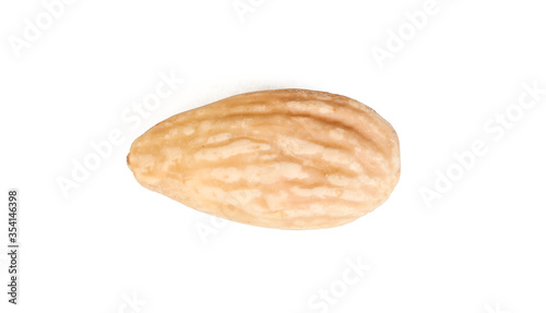 Photos A single blanched almond seed isolated on white background