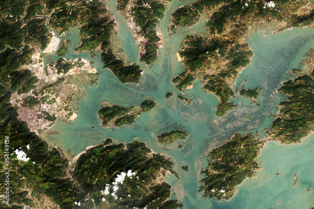 Satellite image of aquaculture in Sansha Bay, China. Contains modified Copernicus Sentinel data 2019.