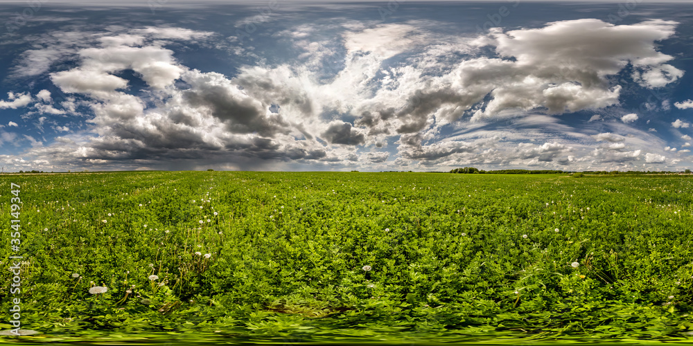 Fototapeta premium full seamless spherical hdri panorama 360 degrees angle view on among fields in spring day with awesome clouds before storm in equirectangular projection, ready for VR AR virtual reality content