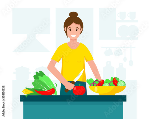 Housewife cooking salad in the kitchen.