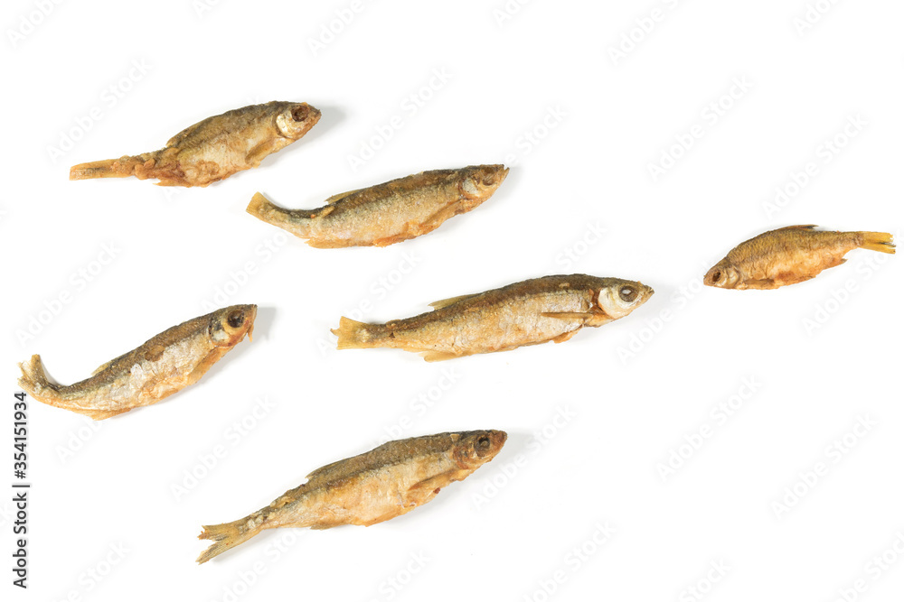 Grilled fish isolated on a white background, top view. Grilled fish isolated on a white background, top view.