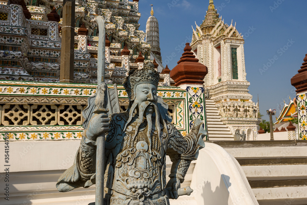 chinese worrior sculpture in Wat Arun a Buddhist temple in Bangkok