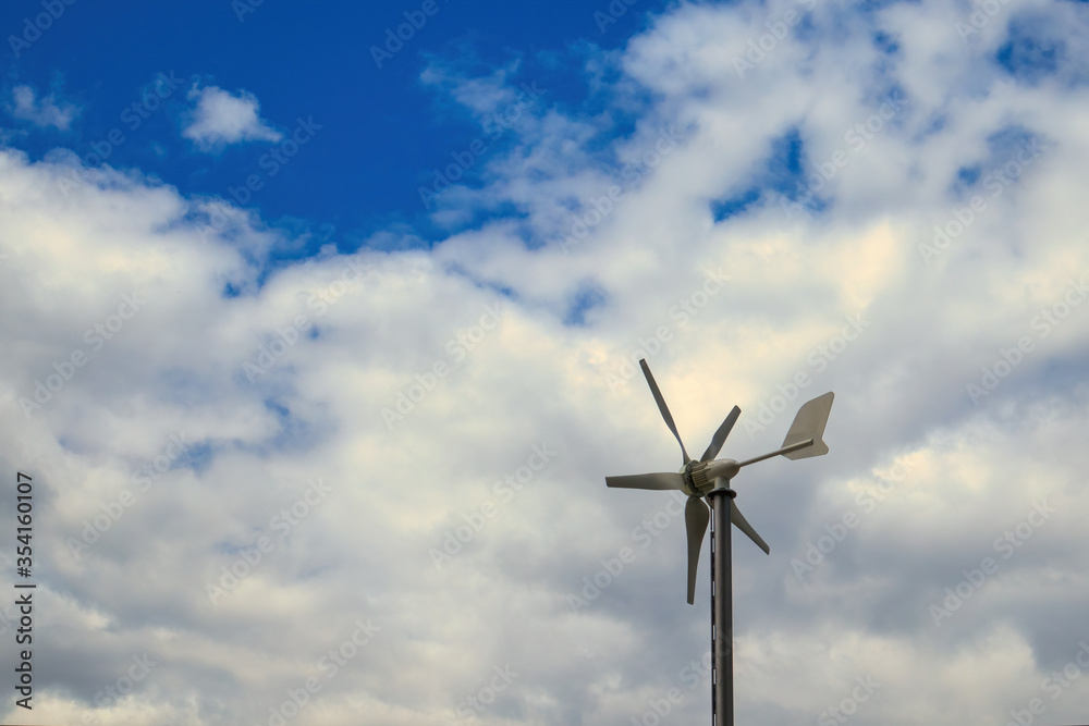 wind turbine against blue sky