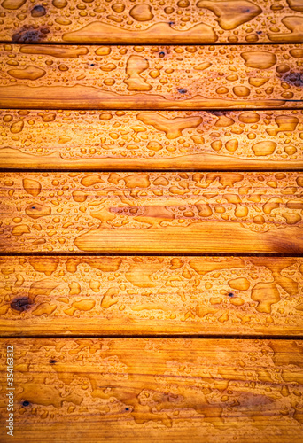 wooden table top with water drops