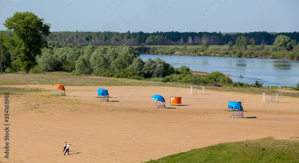 empty beach by the river in eastern europe empty beach by the river in eastern europe