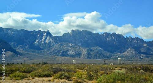 New Mexico desert landscape  high mountains in the background of the desert and drought-tolerant plants  New Mexico