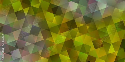 Light Yellow vector pattern with polygonal style with cubes.