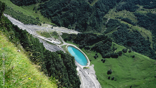 Georgian Military Highway, Russia Georgia Friendship Monument or Treaty of Georgievsk Monument view point of the Artificial lake photo