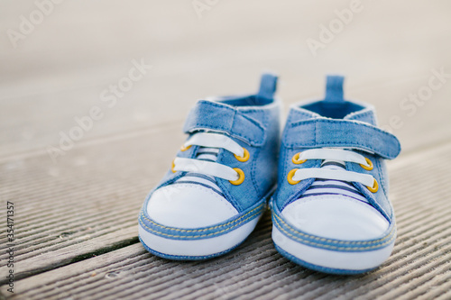 Closeup of a pair of blue baby sneakers