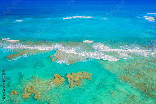 Ocean water surface aerial drone view in Dominican Republic. Vacation background.