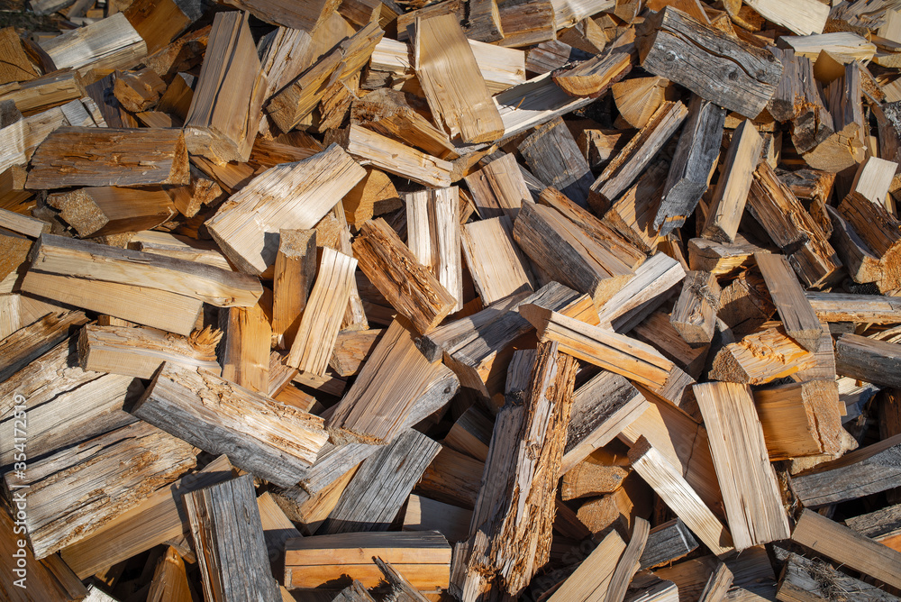 A scattering of firewood. Background image A scattering of firewood. Background image