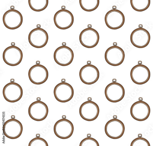 Vector seamless pattern of brown colored hand drawn doodle sketch embroidery hoop isolated on white background