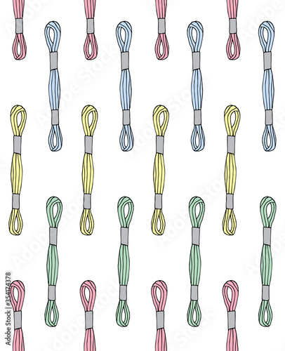 Vector seamless pattern of different pastel colored hand drawn sketch doodle embroidery floss threads isolated on white background