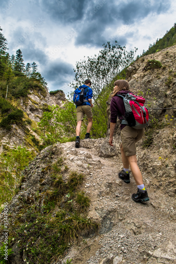 People Walk On Mountain Hiking Trail In Ötschergräben In Austria
