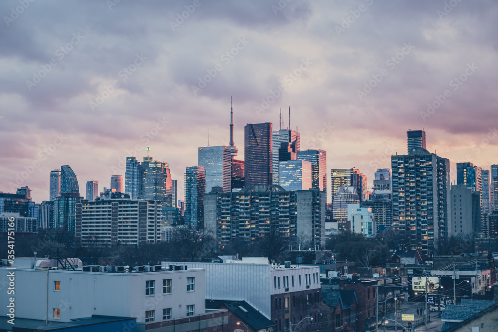 Fototapeta premium A Landmark Peeking Out Behind the Towers