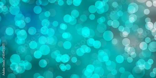 Light BLUE vector layout with circle shapes. Illustration with set of shining colorful abstract spheres. Pattern for booklets, leaflets.