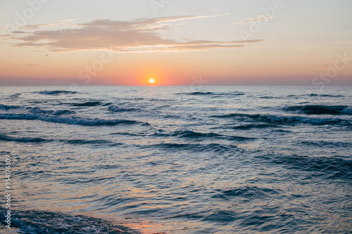 Early morning sunrise over the sea or ocean