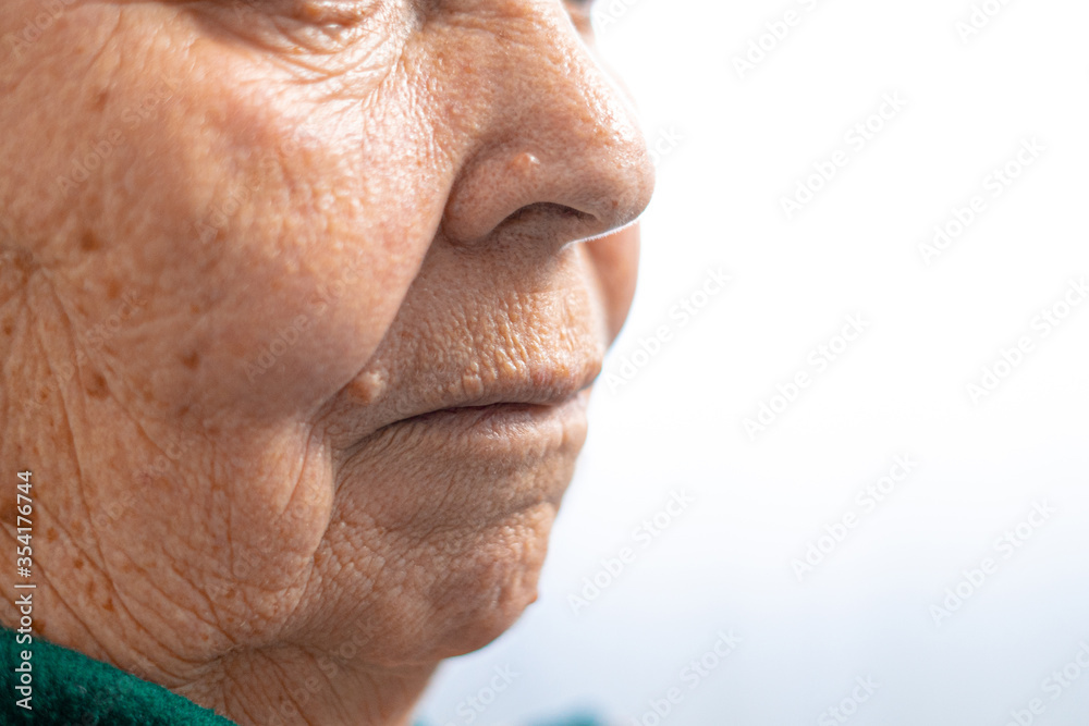 Fototapeta premium Close-up elderly woman, lips of the grandmother