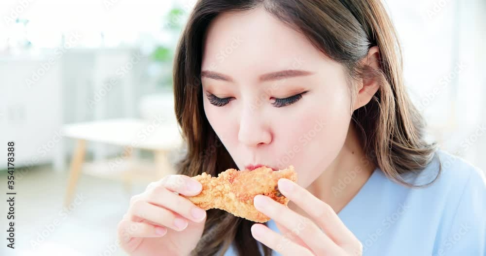 asian woman eat fried chicken asian woman eat fried chicken
