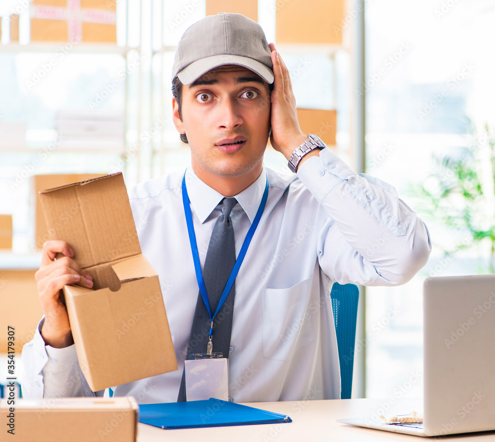 Male employee working in box delivery relocation service Male employee working in box delivery relocation service