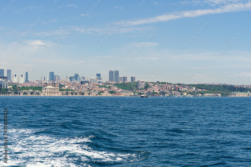panorama of european part of Istanbul city at background, Besiktas area. View from ferry