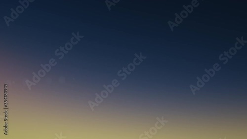 Beautiful night to day transition timelapse video. Sparkle sun moves across clear blue sky. Dynamic light rays, lens flare effects. Sunrise and sunset. Nature concept animation. Seamless loop 4K video