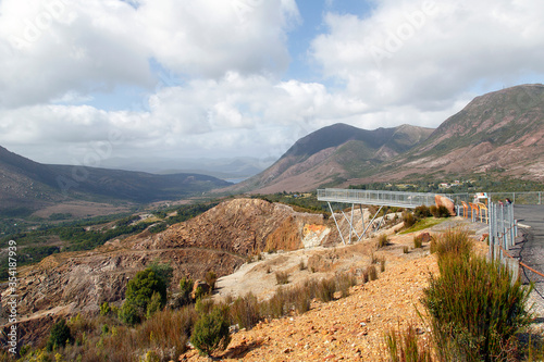 Iron Blow was the site of the earliest major mining venture at Mount Lyell on the west coast of Tasmania. Today it has a cantilever lookout platform for tourists to view the abandoned quarry. photo