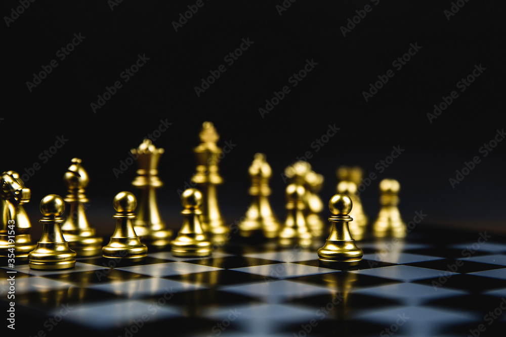 Golden chess that came out of the line Concept of business Strategic plan professional teamwork and management. Golden chess that came out of the line Concept of business Strategic plan professional teamwork and management.
