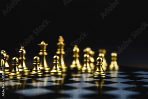 Golden chess that came out of the line Concept of business Strategic plan professional teamwork and management.