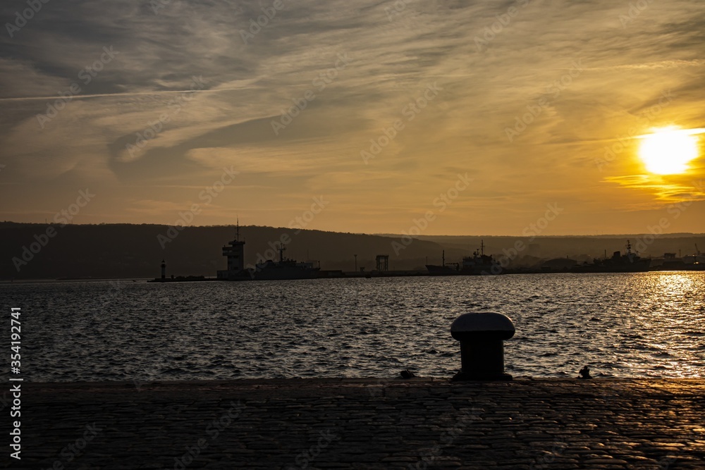 Beautiful sunset over Varna sea port.