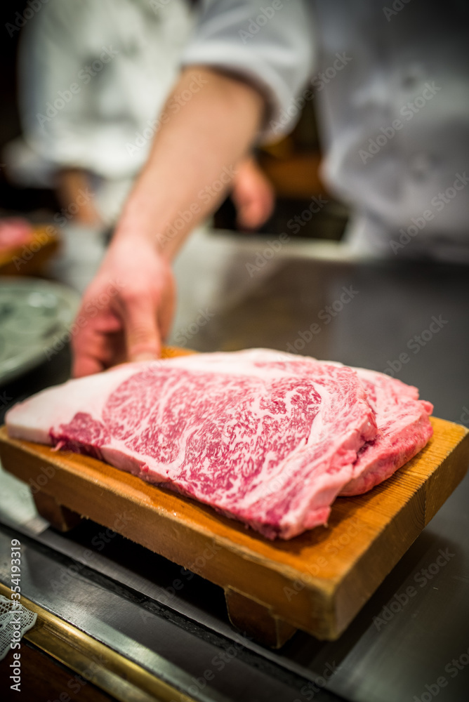 chef preparing japanese kobe beef steak