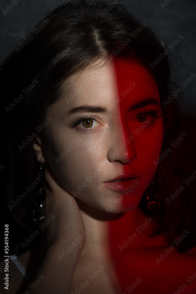 Female studio portrait in low light conditions Female studio portrait in low light conditions