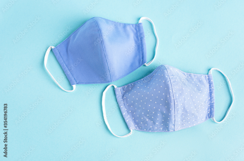 set Hand made Cloth mask Face one piece protection with corona virus on turqouise isolated background. concenpt mask protection corona virus set Hand made Cloth mask Face one piece protection with corona virus on turqouise isolated background. concenpt mask protection corona virus