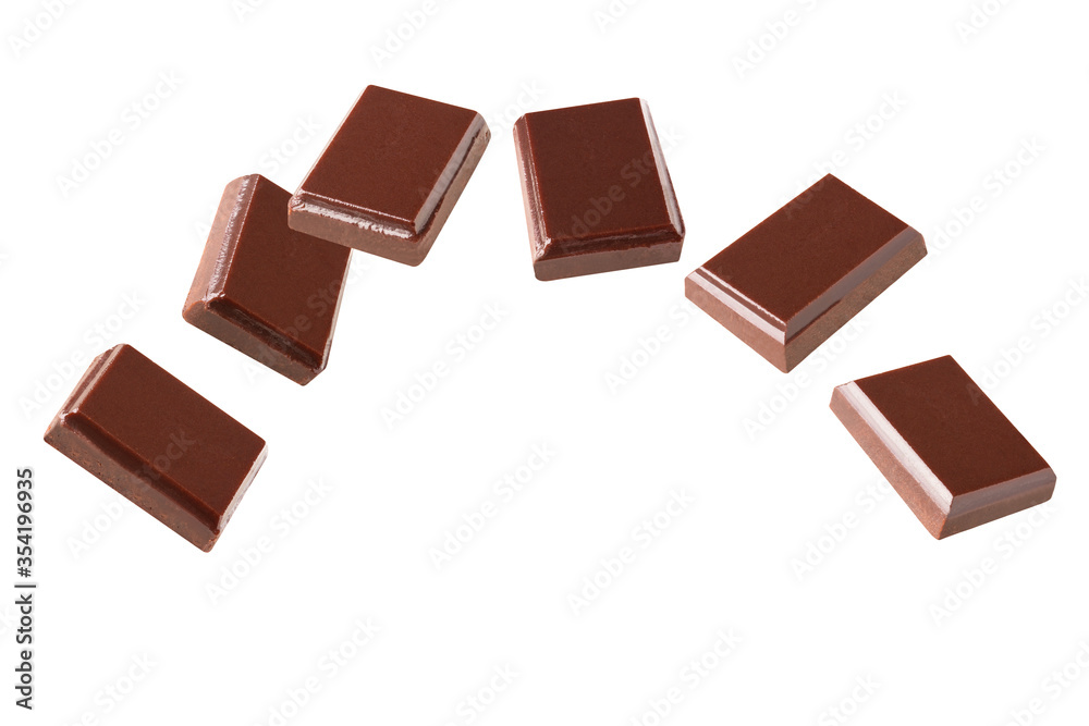 Fototapeta premium chocolate flying pieces in the air on a white background collection .Clipping path.